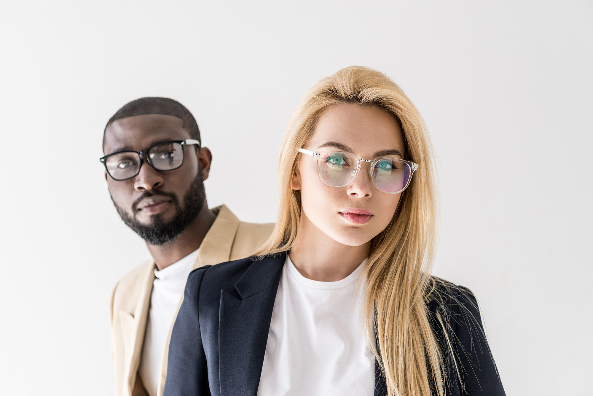 beautiful interracial couple wearing stylish glasses